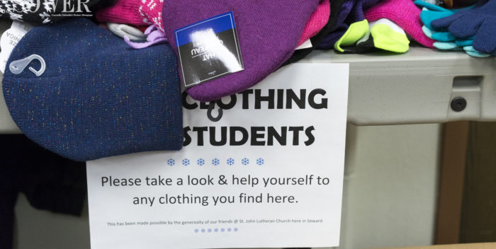 St. John Donates Winter Clothing for Students in Need