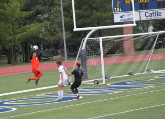 Goalie Federico Andrea Simonetti Catches Shot from Bellevue Player