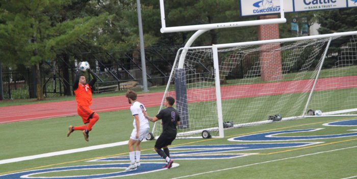 Goalie Federico Andrea Simonetti Catches Shot from Bellevue Player