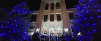 Tenth annual Christmas tree lighting brings students, faculty, community to Weller Hall