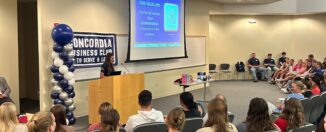 Business Club hosts Olympic athlete at Leadership and Ethics Symposium